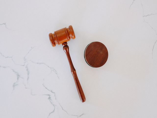 Judge's gavel on a white background