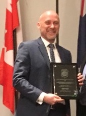 Scott Keay receiving an award
