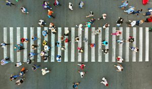 Pedestrian crossing top view. Crosswalk aerial from drone.